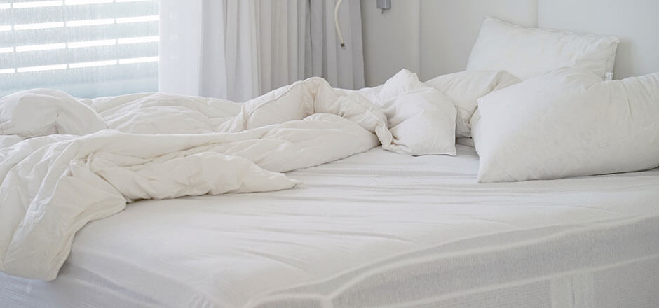 How To Tuck Sheets Under Heavy Mattress?